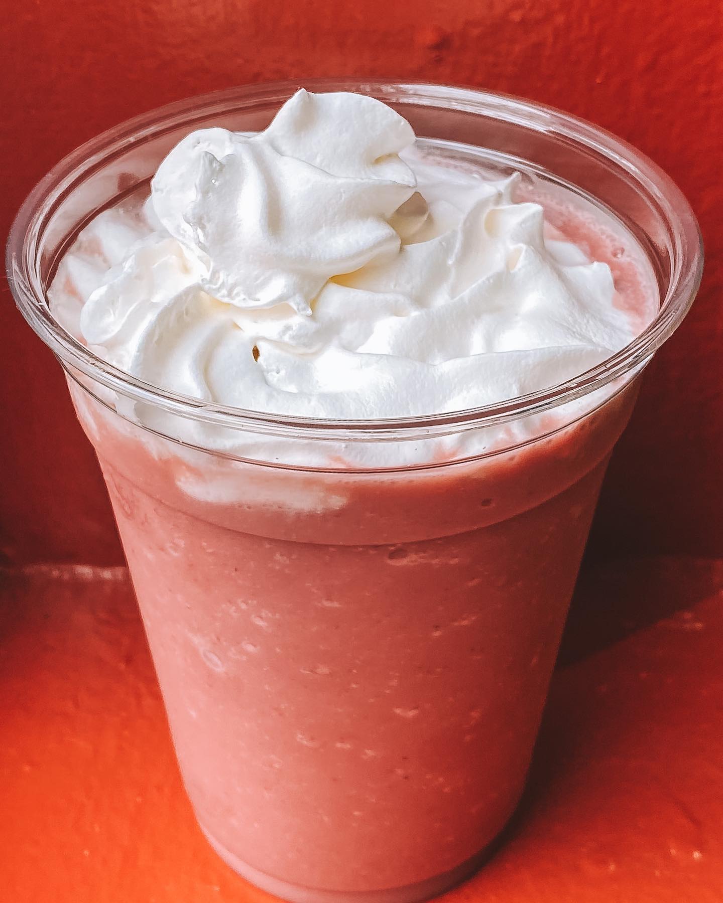 Strawberry smoothie with whipped cream